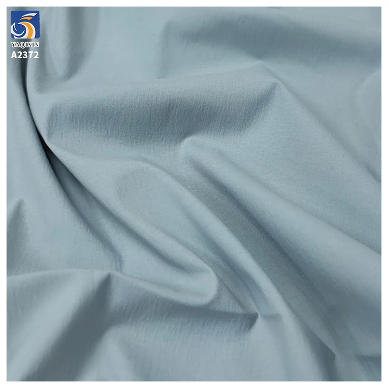 A2372 Custom Color 120gsm Lightweight Breathable Plain Stretch Fabric 95% Nylon 5% Spandex Fabric Pants Stretch Fabric - 图片 3