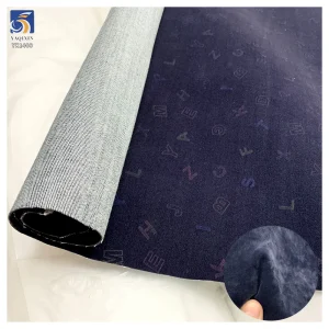 YX1403 2026 10oz High-Stretch Flock Denim Fabric OEM Custom Flocked Flower English Pattern Denim Fabric for Jackets