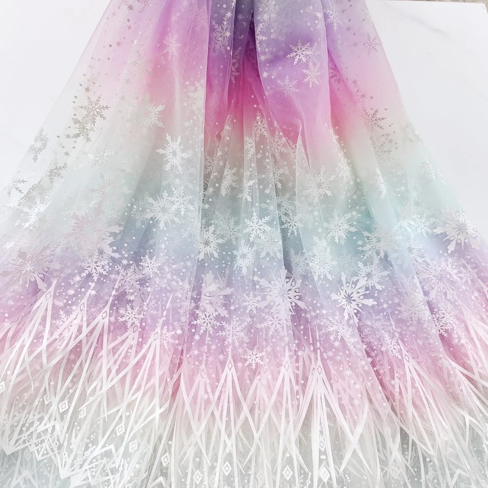 Soft 35gsm 40D Polyester Material Cartoon Snowflake Print Mesh Tulle Fabric with Rainbow Gradient Print Design