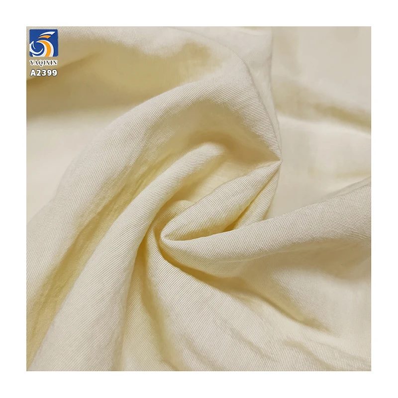A2399 110gsm Lightweight and Breathable Imitation Linen 63% Rayon 37% Nylon Beige Dress Fabric Soft Wrinkled Woven Fabric - 图片 5