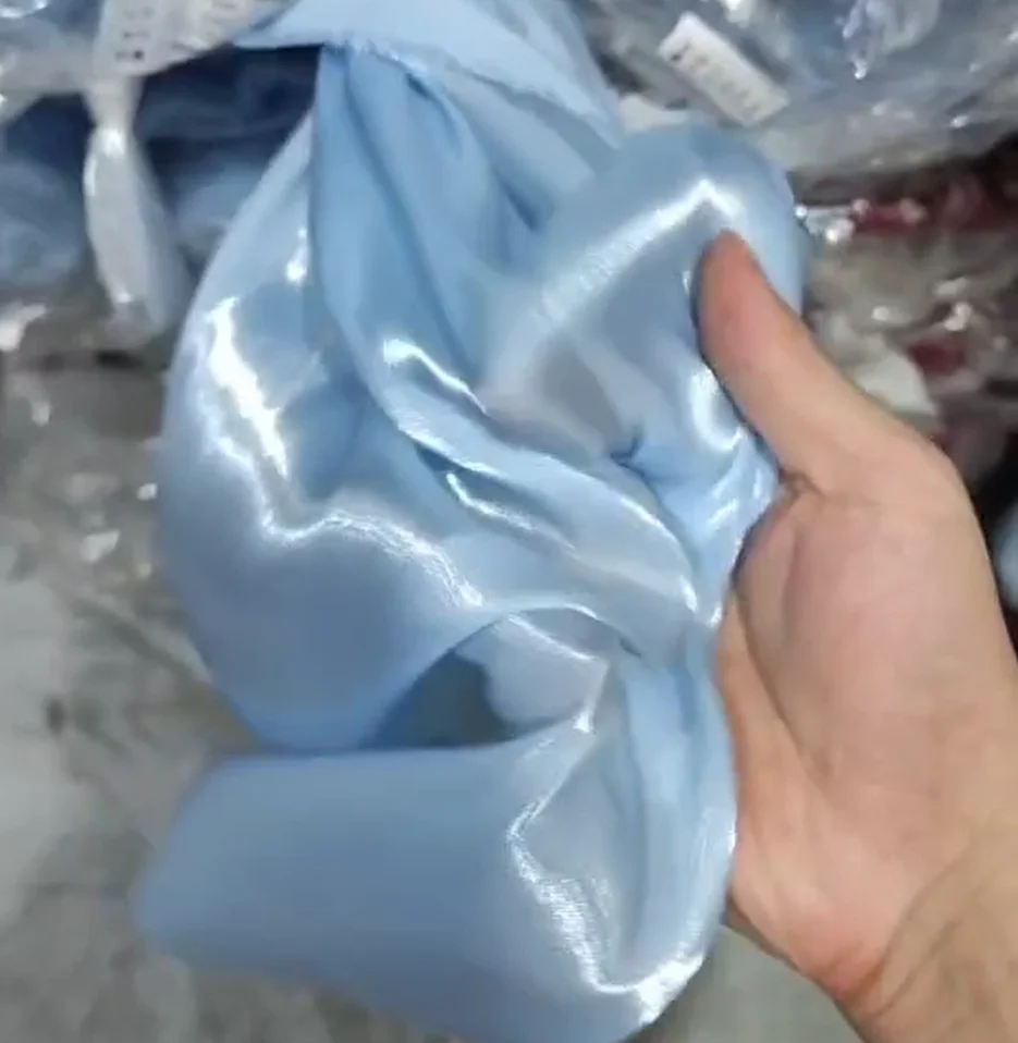 FO001-1 High Quality Luxury Solids Soft Polyester Glossy Organza Fabric Shiny Dress Liquid Organza Fabric - 图片 4