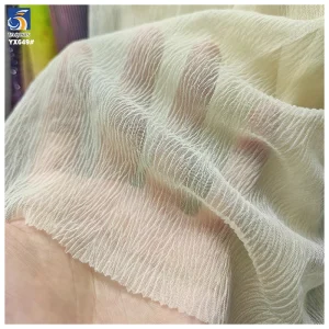 YX649 OEM Customized Colors Soft Breathable 60gsm 100 Polyester Ivory Tulle Mesh Wrinkle Crepe Fabric for Skirts