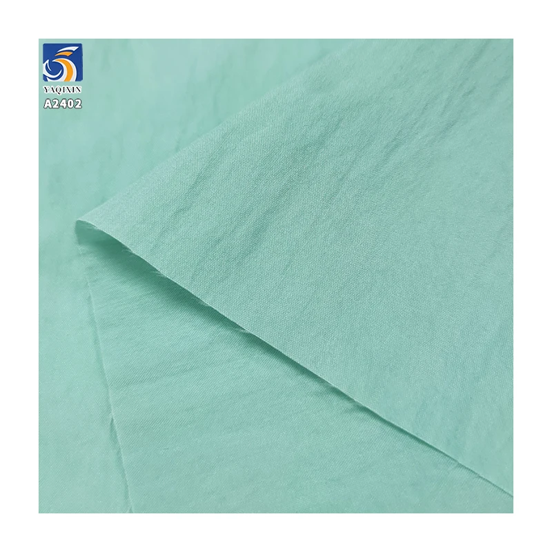 A2402 110gsm Plain Sand Washed Woven 45% Nylon Lyocell Blended Fabric Crepe for Women's Trousers and Long Skirts - 图片 3