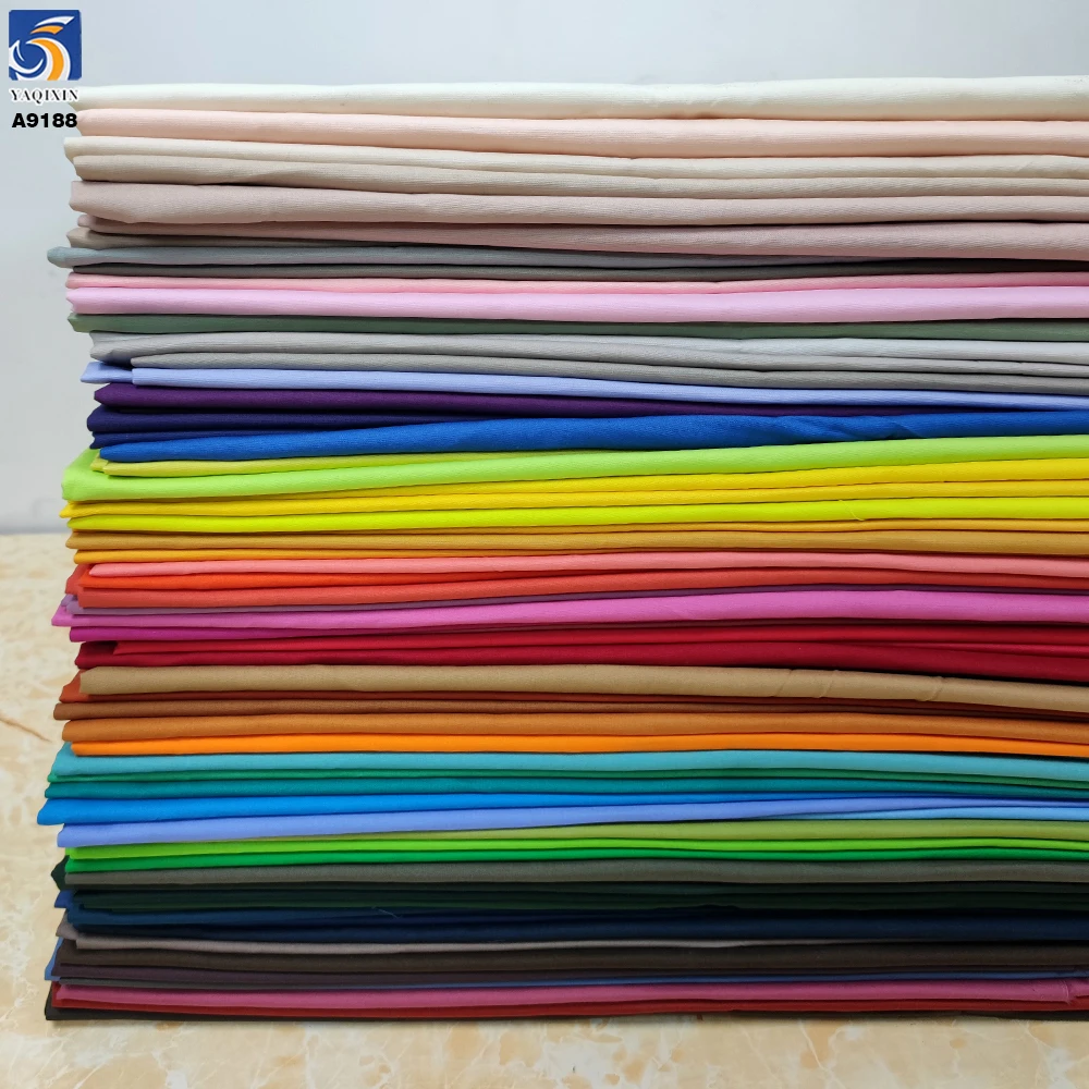 Guangzhou Supplier 400+Colors Woven Plain 100% Cotton Poplin Shirt Fabric for Dresses Clothing Textile