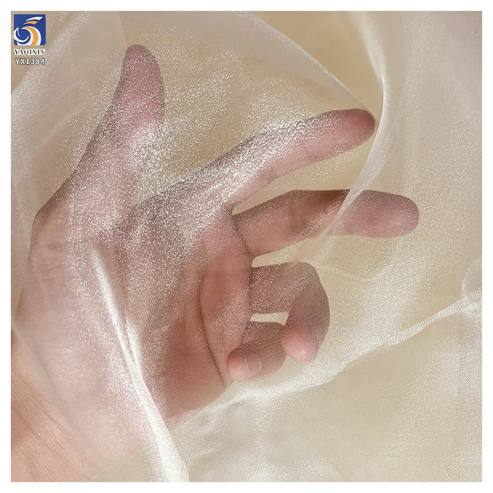 YX1384 35gsm Firm to the Touch Polyester Three-Yarn Organza Fabric Lightweight Stiff Glossy Organza Fabric - 图片 5