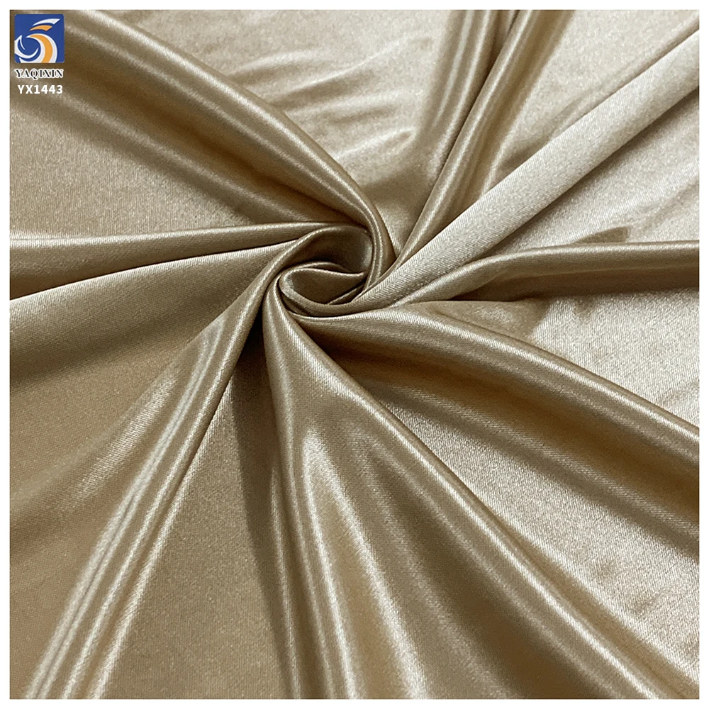 YX1443 90gsm 75D Champagne Gold Glossy Satin Fabric 92% Polyester 8% Spandex Stretch Satin Fabric for Lingerie Skirt Lining - 图片 3