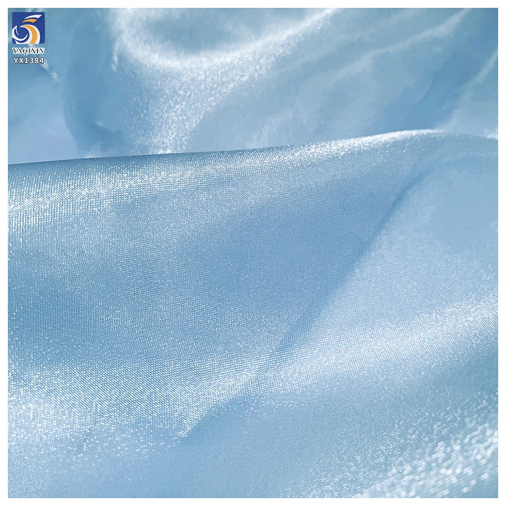 YX1384 35gsm Firm to the Touch Polyester Three-Yarn Organza Fabric Lightweight Stiff Glossy Organza Fabric - 图片 3