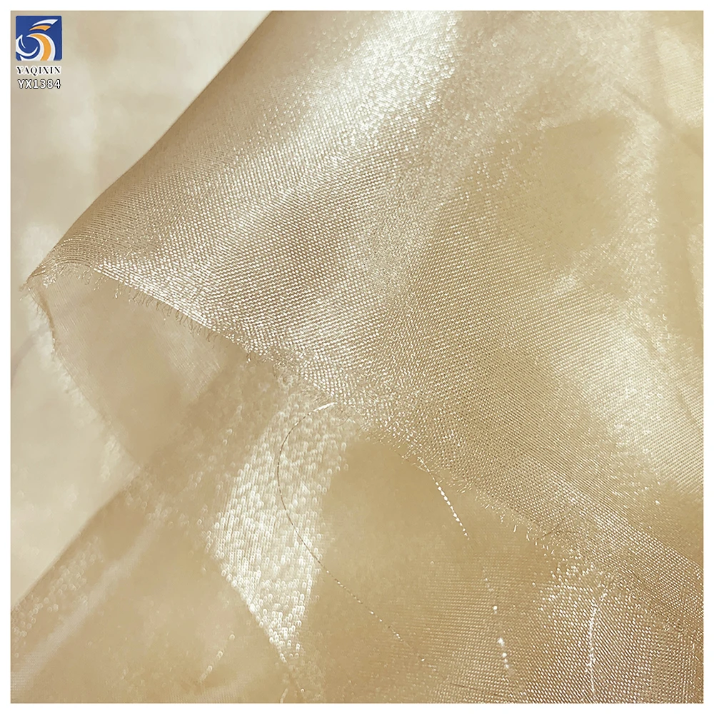 YX1384 35gsm Firm to the Touch Polyester Three-Yarn Organza Fabric Lightweight Stiff Glossy Organza Fabric - 图片 4