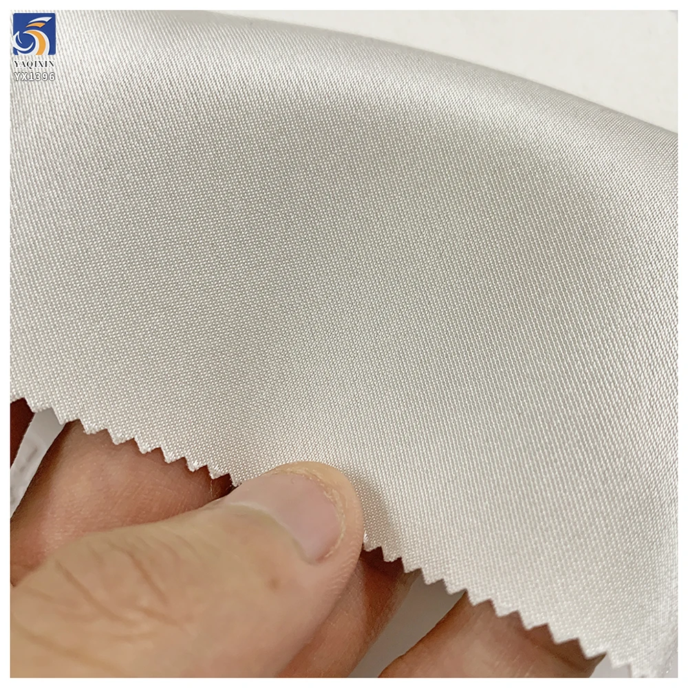 YX1396 220gsm New Arrival Pearl White S-lip Dress Satin Fabric 100% Polyester Non-Stretch Glossy Fashion Grade Satin Fabric - 图片 5