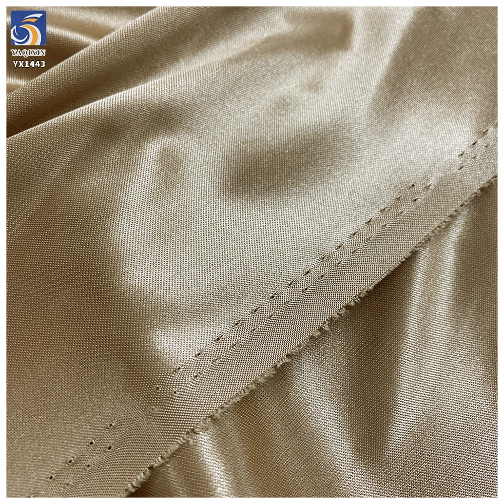 YX1443 90gsm 75D Champagne Gold Glossy Satin Fabric 92% Polyester 8% Spandex Stretch Satin Fabric for Lingerie Skirt Lining - 图片 5
