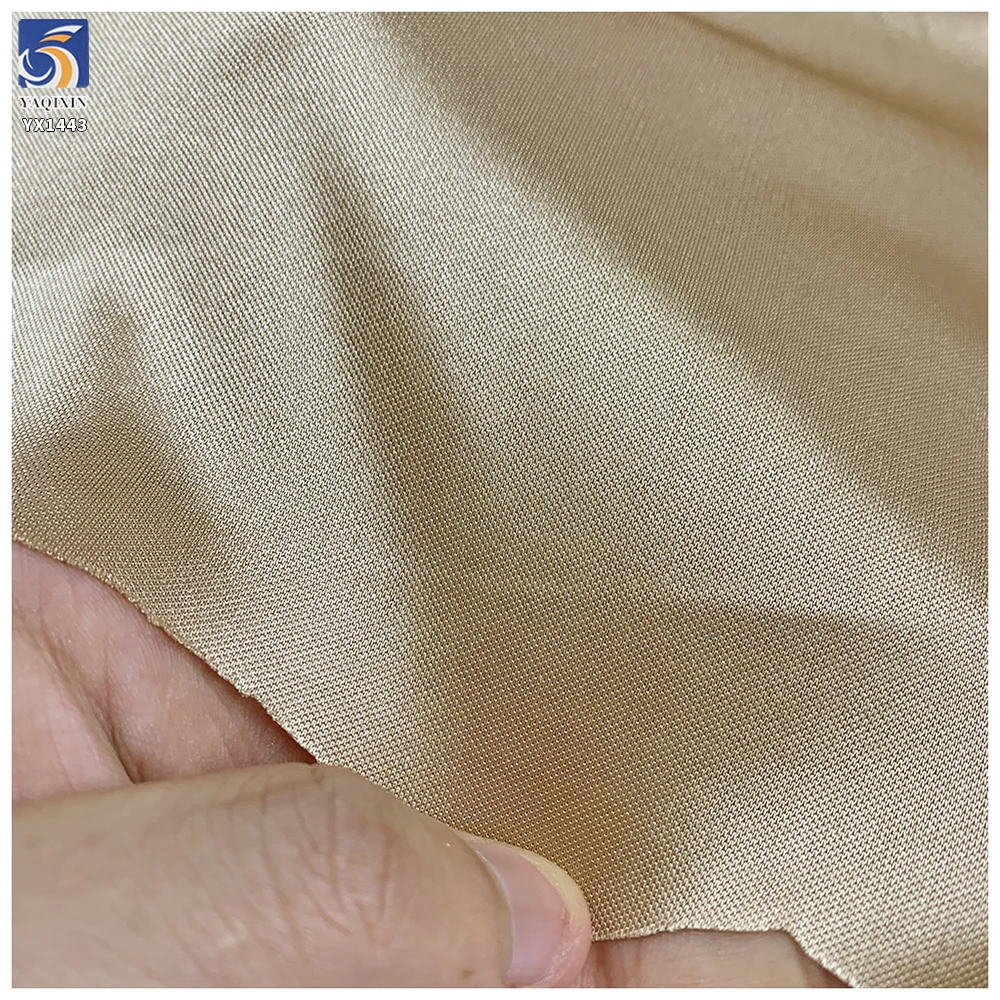YX1443 90gsm 75D Champagne Gold Glossy Satin Fabric 92% Polyester 8% Spandex Stretch Satin Fabric for Lingerie Skirt Lining - 图片 4