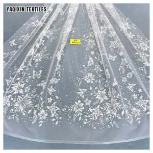 Guangzhou Manufacturer Design Custom Luxurious Pure White Wedding Laces Fabrics Polyester Tulle Bridal Glitter Lace Fabric...