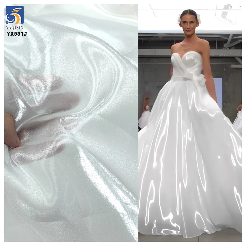 YX581-2 Hot Selling Woven Polyester White Organza Fabric for Bride Soft Wedding Shiny Mikado Liquid Organza Fabric - 100%...
