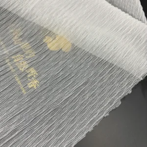 YX649 OEM Customized Colors Soft Breathable 60gsm 100 Polyester Ivory Tulle Mesh Wrinkle Crepe Fabric for Skirts - 100%...