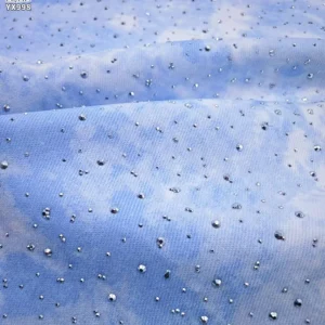 YX998 220g/m² Tie-dye Design Denim Fabric 70% Polyester 30% Cotton Denim Tie-dye Fabric With Diamonds for Women's Skirt...