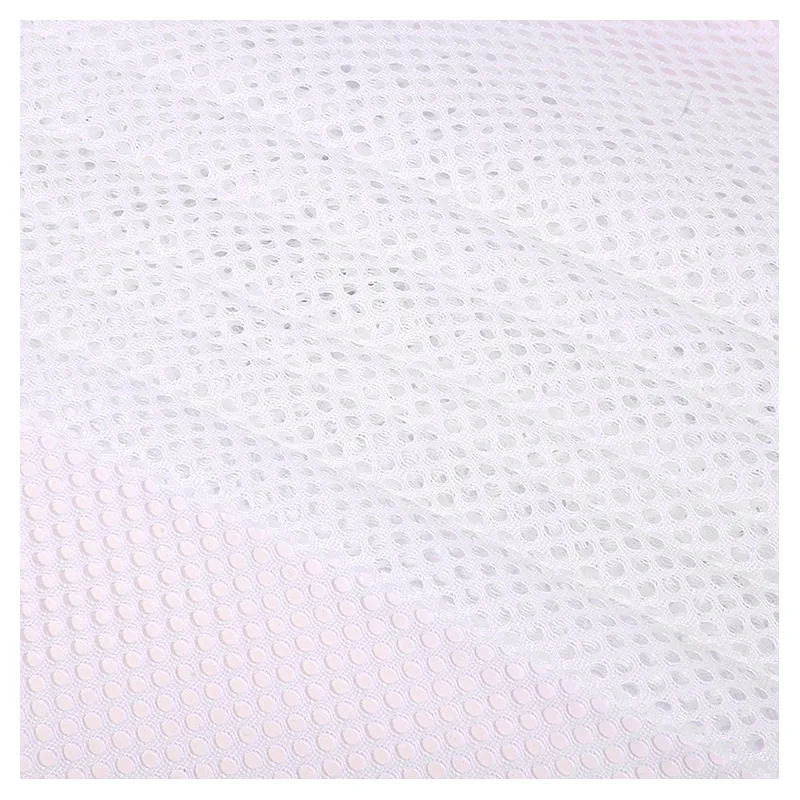 Stock Lot Wholesale Price 250gsm Soft 100%Polyester Tricot Knitted Hexagonal Mesh Fabric for Sports Wear Bags Office Chair