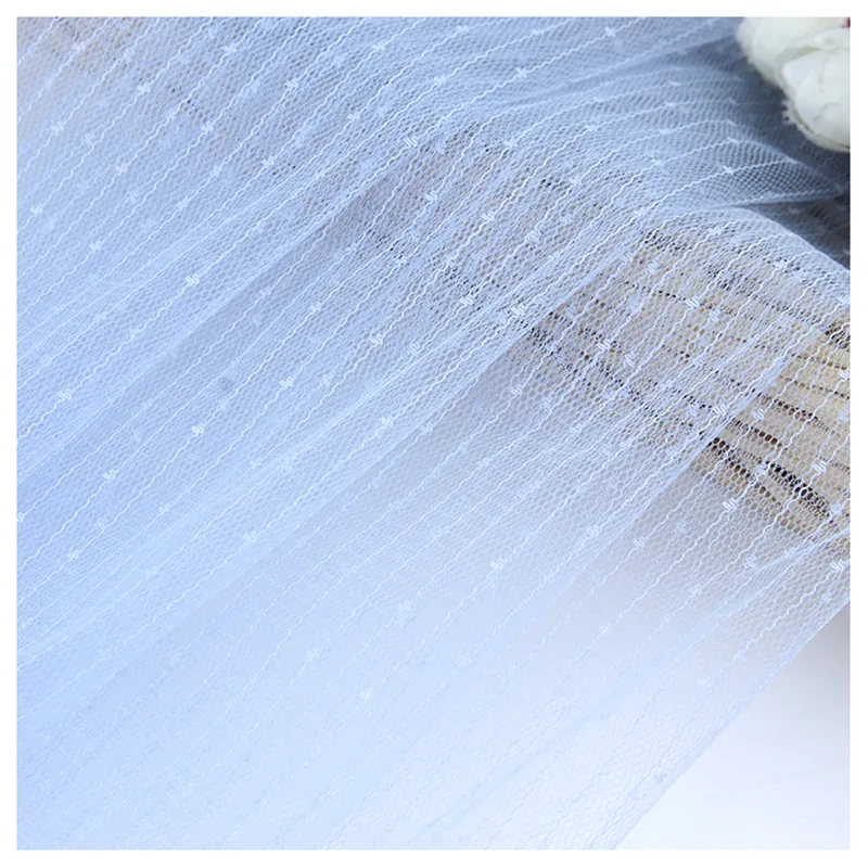 Wholesale Prices Solid Polyester Elegant Tulle Fabric Dotted Jacquard Mesh Bridal Lace Fabric for Wedding Veil Dress