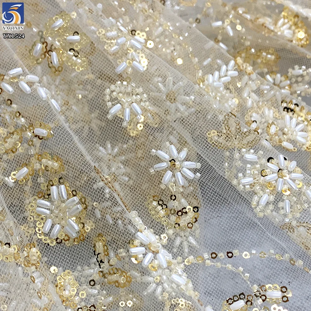 YX1524 2026 Wholesale Champagne Gold Shiny Floral Beaded Sequin Lace Fabric Heavy Embroidered Mesh Tulle for Evening Dress