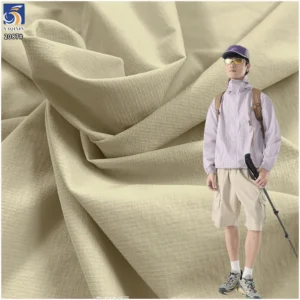 YX2087 110gsm Lightweight 88% Nylon 12% Spandex Jacquard Grid Fabric 4 Way Stretch for Hiking Jackets and Sportswear