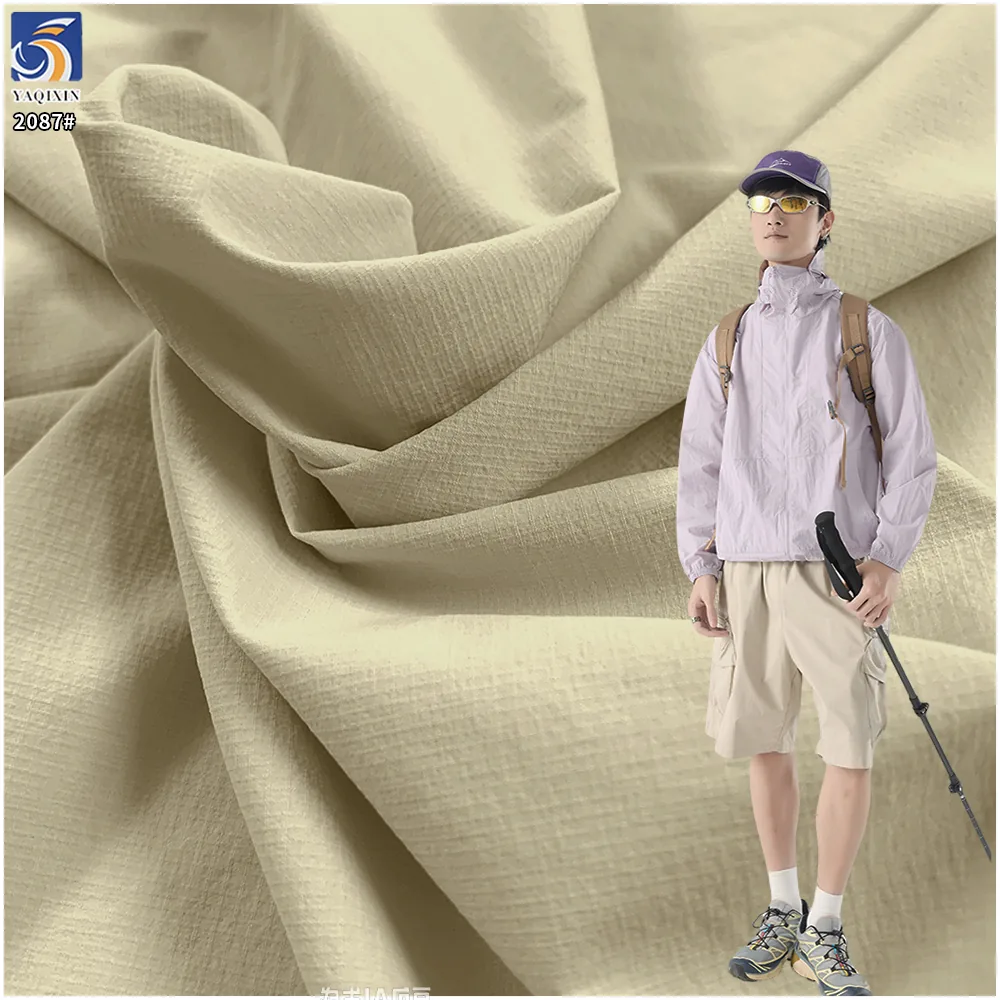 YX2087 110gsm Lightweight 88% Nylon 12% Spandex Jacquard Grid Fabric 4 Way Stretch for Hiking Jackets and Sportswear