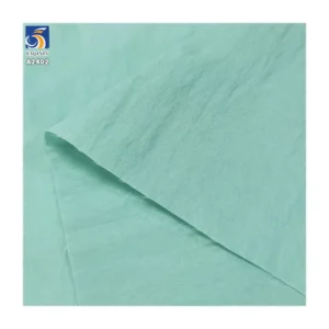 A2402 110gsm Plain Sand Washed Woven 45% Nylon Lyocell Blended Fabric Crepe for Women's Trousers and Long Skirts
