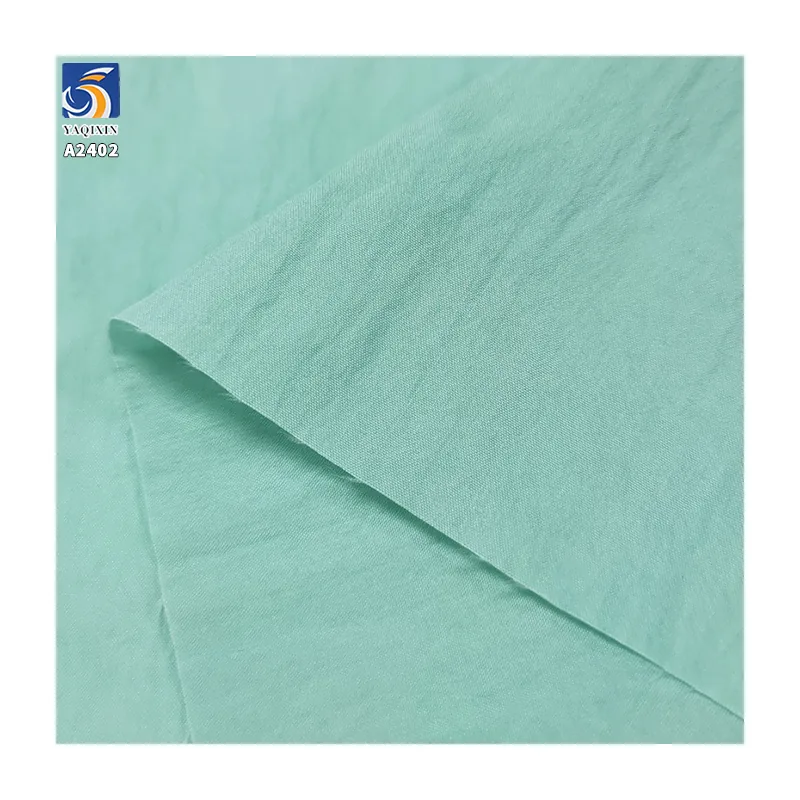 A2402 110gsm Plain Sand Washed Woven 45% Nylon Lyocell Blended Fabric Crepe for Women's Trousers and Long Skirts