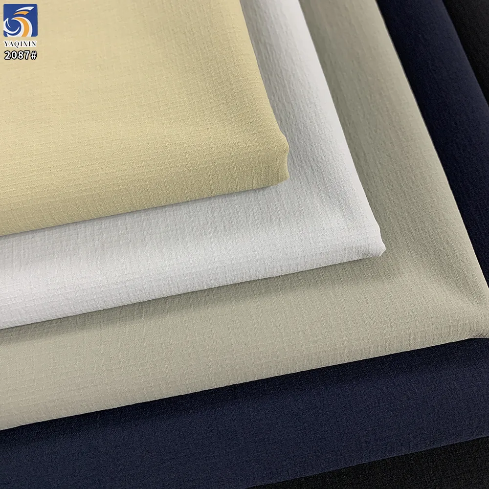 YX2087 110gsm Lightweight 88% Nylon 12% Spandex Jacquard Grid Fabric 4 Way Stretch for Hiking Jackets and Sportswear