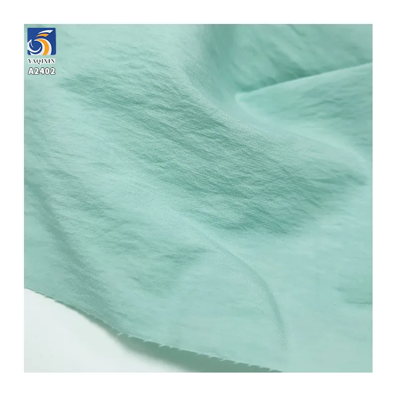 A2402 110gsm Plain Sand Washed Woven 45% Nylon Lyocell Blended Fabric Crepe for Women's Trousers and Long Skirts