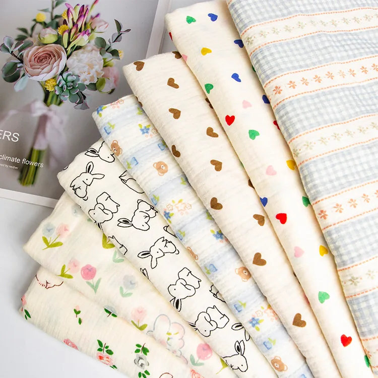 YX1368 120gsm Breathable Comfortable Crinkled 100% Cotton Double Crepe Muslin Fabric Bibs Clothes Baby Printed Cotton Fabric